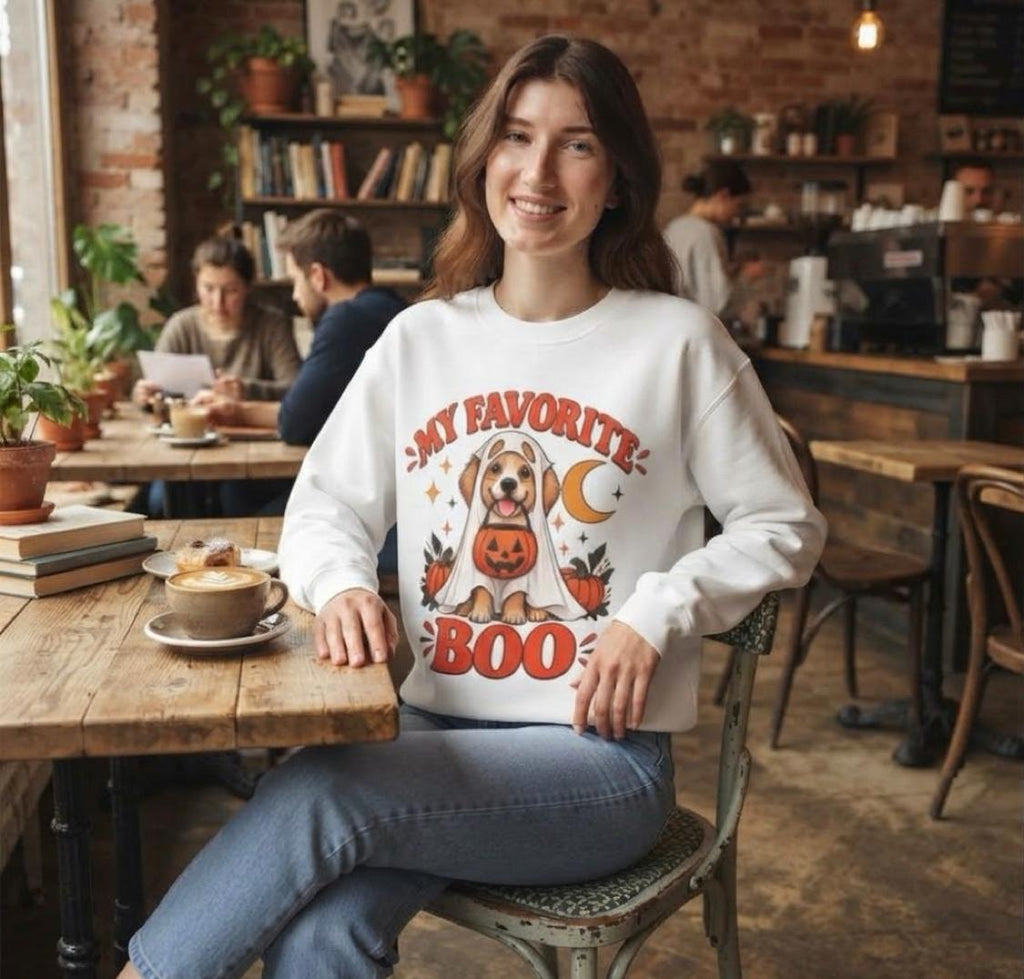 Get into the cozy, spooky spirit with our 'My Dog Is My Favorite Boo' Crewneck Sweatshirt!