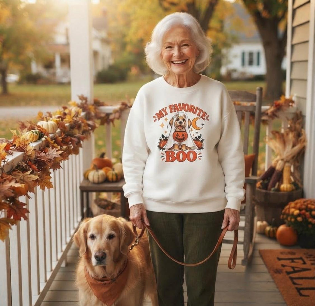 Get into the cozy, spooky spirit with our 'My Dog Is My Favorite Boo' Crewneck Sweatshirt!