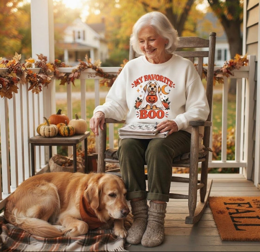 Get into the cozy, spooky spirit with our 'My Dog Is My Favorite Boo' Crewneck Sweatshirt!